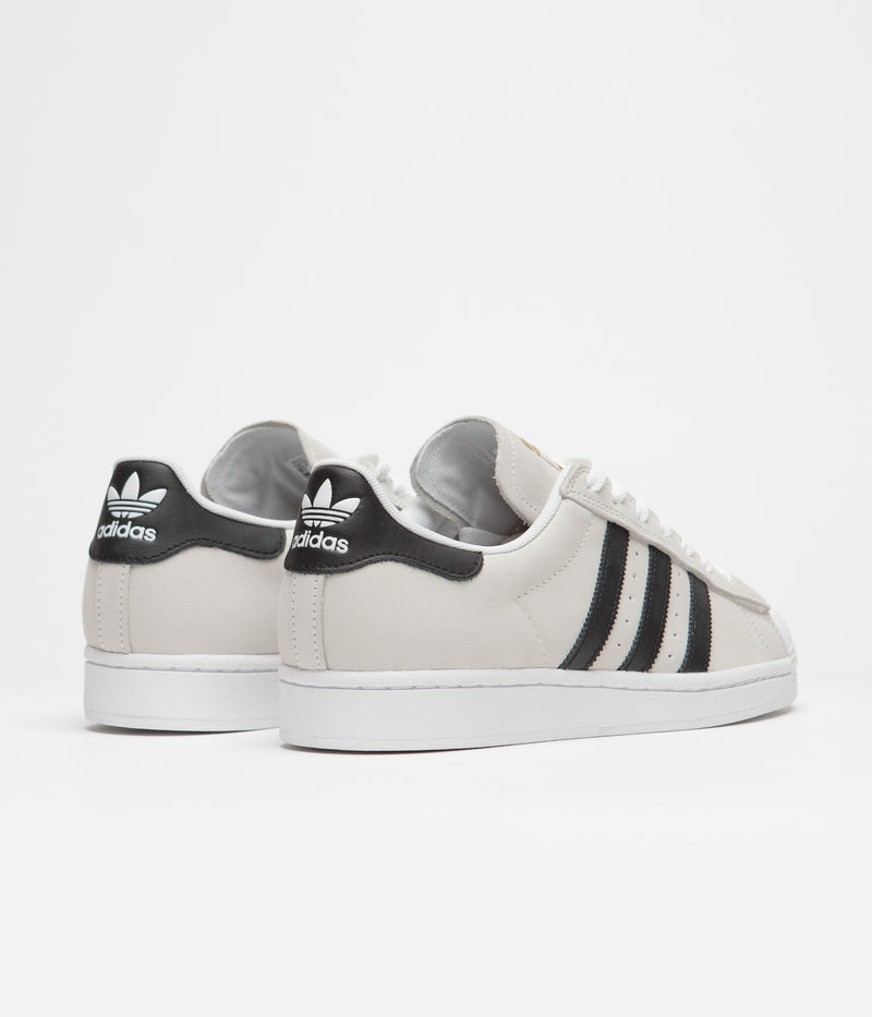 Adidas Superstar Shoes in White and Core Black / Gold Metallic