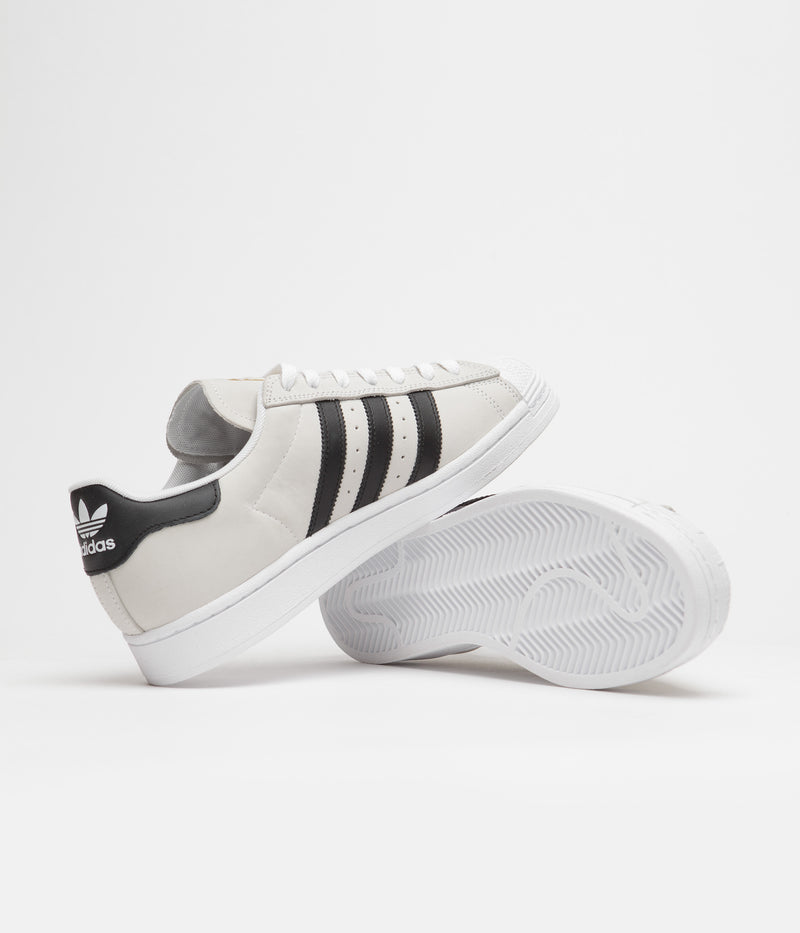 Adidas Superstar Shoes in White and Core Black / Gold Metallic