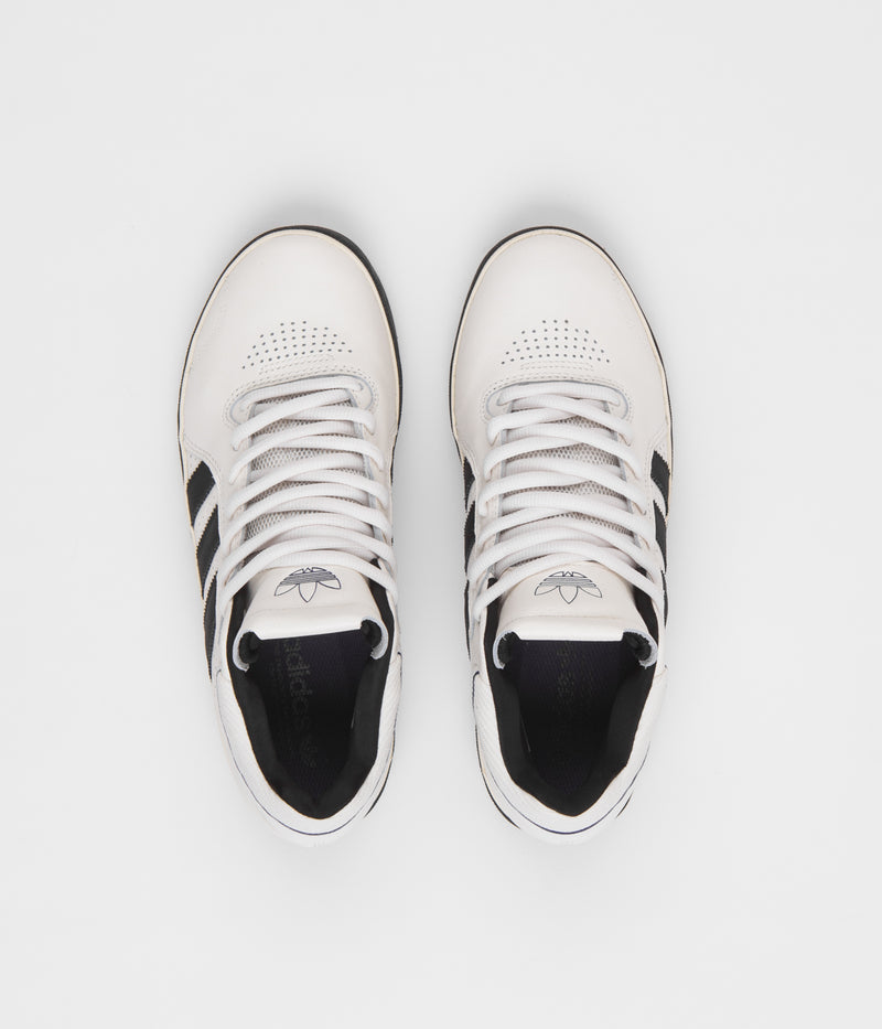 Adidas Tyshawn Shoes in Cloud White and Core Black / Collegiate Purple