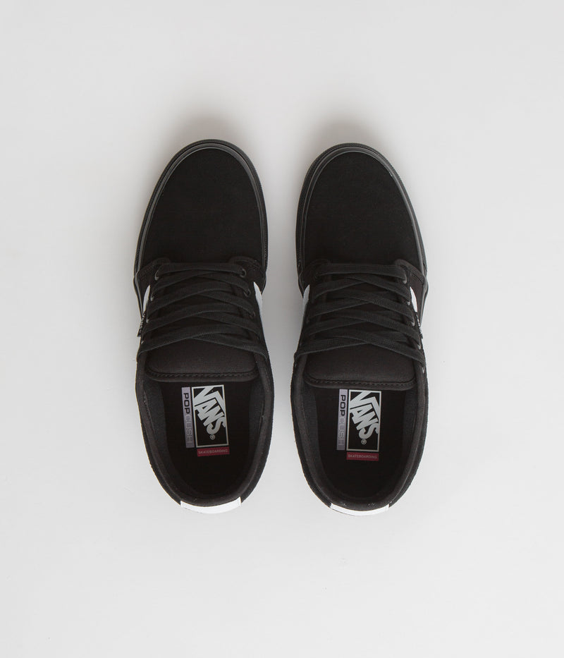 Vans Chukka Sidestripe Shoes in Black and Black / White