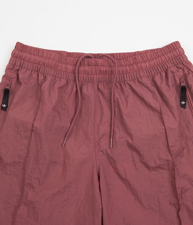 Adidas Wind Shorts in Quiet Crimson and Focus Olive