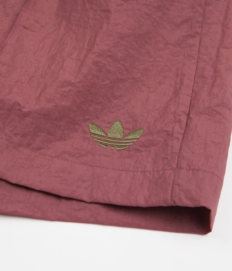 Adidas Wind Shorts in Quiet Crimson and Focus Olive