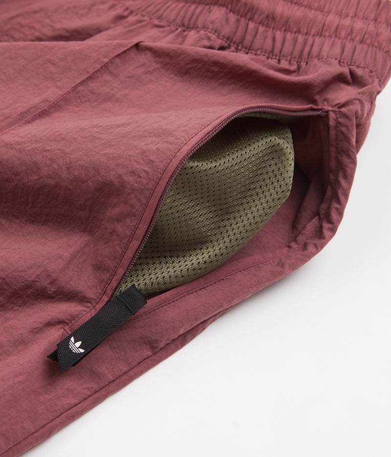 Adidas Wind Shorts in Quiet Crimson and Focus Olive