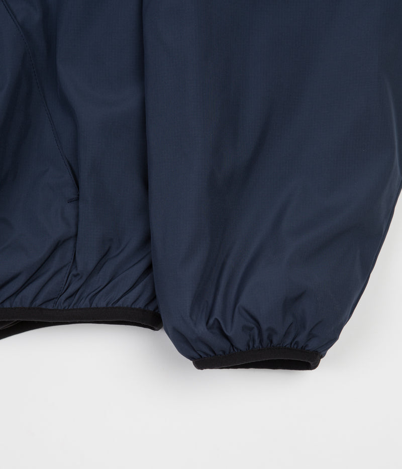 Yardsale Reversible Half-Zip Puffer Jacket in Navy and Black